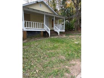 Charming single-story home with inviting front porch and yard at 116 Dunstan Ave, Durham, NC 27707