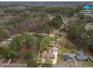 Aerial view of property with 1.1 acres and proximity to downtown Franklinton at 412 N Cheatham St, Franklinton, NC 27525