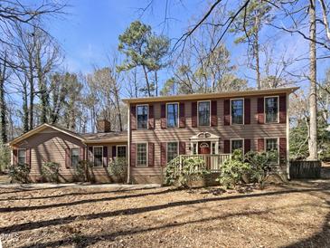 Charming two-story home with a well-maintained front yard and a welcoming entryway at 120 Chattleton Ct, Durham, NC 27712