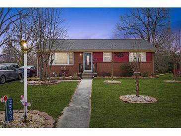 Charming single-story home with a well-maintained front yard and inviting curb appeal at 2503 Mckinney St, Burlington, NC 27217