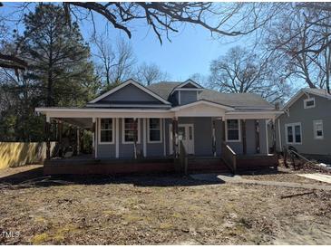 Charming single-Gathering home features a cozy covered porch and traditional architectural details at 425 S Mercer St, Rocky Mount, NC 27801