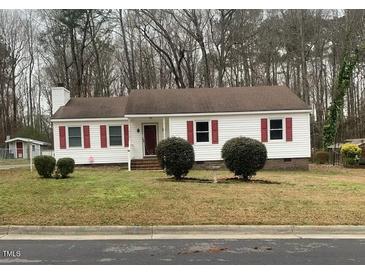 Charming single-story home featuring white siding, red shutters, and a well-maintained front lawn at 912 Pamela Ln, Rocky Mount, NC 27803
