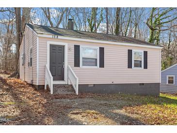 Charming single-story home featuring a stone foundation and traditional siding at 158 Torain St, Hillsborough, NC 27278