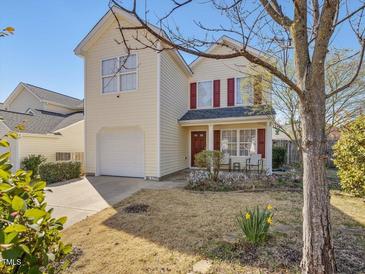 Charming two-story home with a red-shuttered front window and well-maintained landscaping at 200 Indian Branch Dr, Morrisville, NC 27560