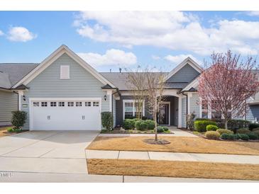 Charming home with a two-car garage and well-manicured landscaping at 1214 Gaston Manor Dr, Durham, NC 27703
