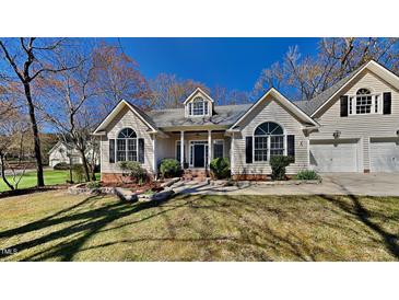 Charming single-Gathering home with a well-manicured front yard and inviting entrance in a desirable neighborhood at 3704 Sky Meadow Dr, Apex, NC 27539