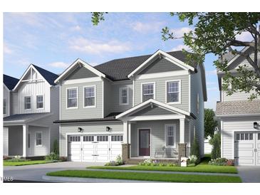 Charming two-story home with gray siding, covered porch, and attached two-car garage at 280 Beacon Dr, Pittsboro, NC 27312