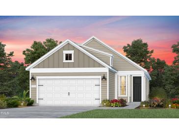 Two-story home with neutral siding, two car garage, landscaped yard and beautiful sunset at 2340 Beeblossom Pl, Fuquay Varina, NC 27526