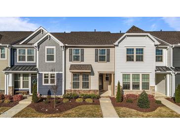 Charming townhomes featuring varied siding, manicured lawns, and inviting curb appeal at 6205 Taylor Rd, Wendell, NC 27591
