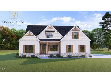 Charming new construction home with board and batten siding, stone accents, and a welcoming front porch at 3400 River Manor Ct, Franklinton, NC 27525