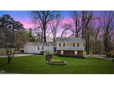 Charming two-story home with a landscaped front yard and inviting curb appeal at 1101 Driftwood Dr Dr, Siler City, NC 27344