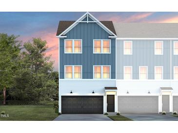 Charming new construction townhome with craftsman style design and two-car garage at 1501 Tamarisk Ln, Durham, NC 27703
