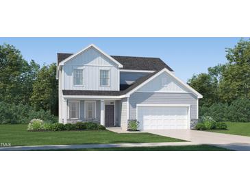 Charming two-story home featuring stone accents, a two-car garage, and a well-manicured lawn at 4012 Shadbush St, Raleigh, NC 27616
