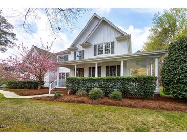 Charming two-story home with a large front porch and well-manicured landscaping at 101 Goldenthal Ct, Cary, NC 27519