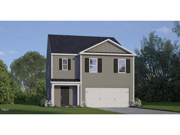 Charming two-story home featuring gray siding, a two-car garage, and a well-manicured lawn at 200 Olive Branch St, Sanford, NC 27332