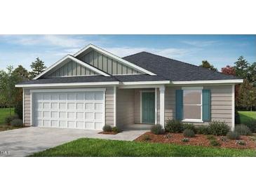 Charming single-story home featuring a neutral color palette, a two-car garage, and a welcoming front entrance at 160 Chestnut Oak Ln, Lillington, NC 27546