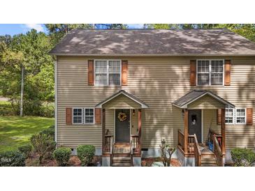 Charming townhouse featuring a welcoming front entrance and classic curb appeal in a well-maintained neighborhood at 202 Allen St # A/B, Creedmoor, NC 27522