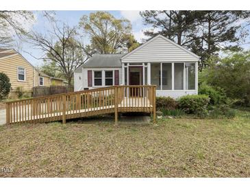 Charming home with a wooden ramp and screened porch, offering accessibility and outdoor enjoyment at 2106 Ruffin St, Durham, NC 27704