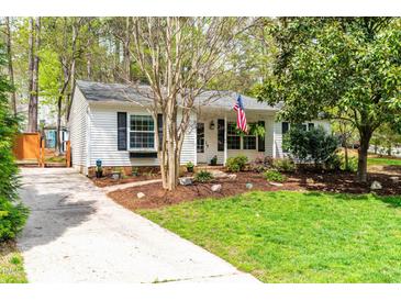 Charming single-story home with landscaped front yard and welcoming curb appeal at 2400 Perennial St, Raleigh, NC 27603