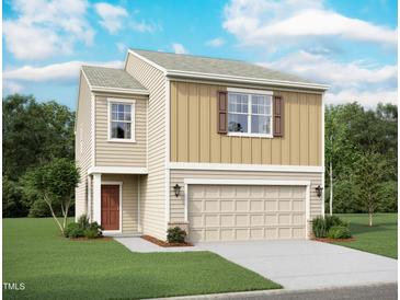 Charming two-story home featuring neutral siding, a two-car garage, and a well-maintained lawn at 1164 Solace Way, Rolesville, NC 27571