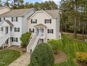 Inviting two-story townhouse with a charming entrance and well-manicured landscaping at 120 Schultz St, Chapel Hill, NC 27514