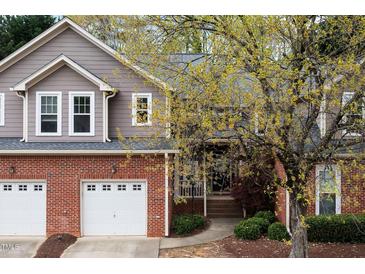 Charming two-story home featuring a two-car garage and well-maintained landscaping at 11011 Southwalk Ln, Raleigh, NC 27614