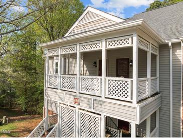 Charming condo with a private, lattice-adorned covered porch for outdoor enjoyment and relaxation at 102 Choptank Ct # B5, Cary, NC 27513