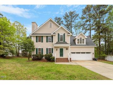 Charming two-story home with a well-manicured lawn and inviting curb appeal at 903 Norwood Lane Ln, Apex, NC 27502