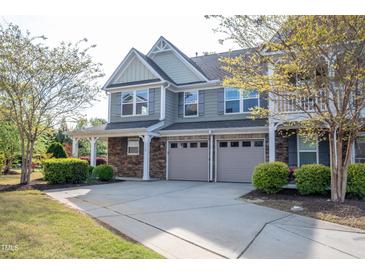 Charming two-story home with a two-car garage and well-maintained landscaping at 112 Red Admiral Ct, Hillsborough, NC 27278