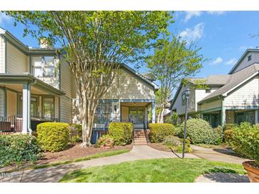 Charming townhouse with lush landscaping, inviting front porch, and well-maintained exterior features at 507 Presque Isle Ln # Bldg 500, Chapel Hill, NC 27514