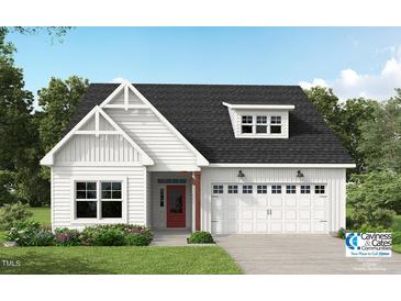 Charming single-Gathering home featuring a welcoming front porch, a red door, and a well-manicured lawn at 90 Malbec Way, Youngsville, NC 27596