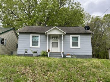 Charming one-story home featuring a cozy entrance and a well-maintained front lawn at 5116 Nc 56 Hwy, Franklinton, NC 27525