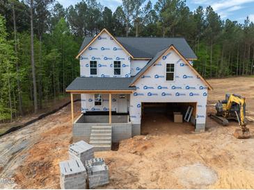 Charming two-story new construction home with attached garage on a spacious lot, ready to be customized at 85 Purslane Dr, Franklinton, NC 27525