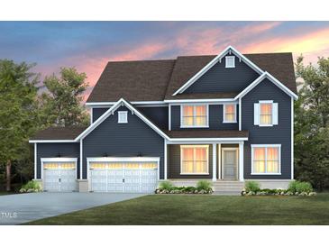 New construction home with a two-car garage, covered porch, beautiful lawn and professional landscaping at 382 Belmont Stakes Ln, Wendell, NC 27591