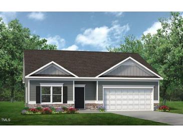 Charming single-story home with gray siding, a one-car garage, and fresh landscaping at 290 Deodora Ln, Cameron, NC 28326