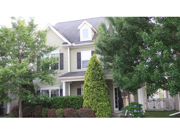 Charming two-story home with well-maintained landscaping and a welcoming front porch at 742 Keystone Park Dr, Morrisville, NC 27560