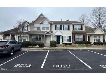 Inviting townhome with well-maintained landscaping and convenient parking at 8013 River Water Ct, Raleigh, NC 27616