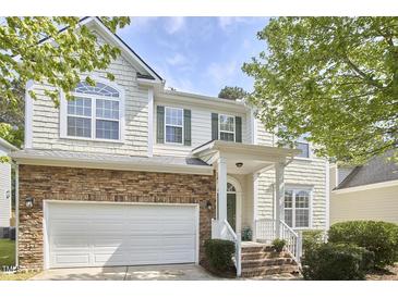 Charming two-story home featuring a stone facade and a well-maintained front yard at 1201 Bellenden Dr, Durham, NC 27713