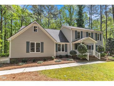 Charming two-story home with classic shutters and lush landscaping at 108 Maplewood Dr, Knightdale, NC 27545