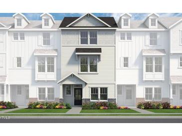 New construction townhouse with charming curb appeal and beautiful landscaping at 219 Pond Vw Ct # 8, Fuquay Varina, NC 27526