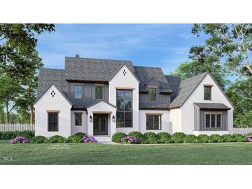 Stunning new construction featuring a white brick facade, gray accents, and professionally landscaped front yard at 97 Fox Oak Trl, Pittsboro, NC 27312