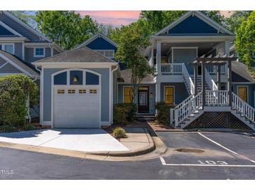 Charming two-story townhome with a two-car garage and upper-level covered porch in a desirable neighborhood at 511 Hillsborough St # 103, Chapel Hill, NC 27514
