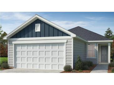 Charming single-story home featuring a two-car garage and stylish blue and white accents on the gabled roof at 2672 Princess Tree Dr, Raleigh, NC 27616