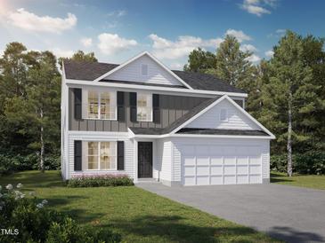 Charming two-story home featuring gray and white siding, black shutters, and a two-car garage, surrounded by lush greenery at 213 Delma Grimes Rd, Coats, NC 27521