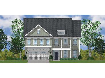 Charming two-story home boasts a symmetrical facade and well-maintained landscaping at 3019 Dog Rose Dr # 168, Durham, NC 27703