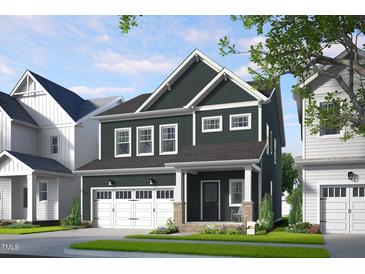 Charming two-story home with gray siding, white trim, and a welcoming front porch at 334 Beacon Dr, Pittsboro, NC 27312