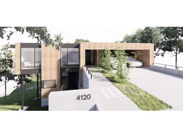 Stunning modern home featuring wood siding, large windows, and covered parking at 4120 Picardy Dr, Raleigh, NC 27612