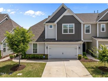 Charming two-story home with a two-car garage and well-maintained landscaping at 450 Shale Creek Dr, Durham, NC 27703