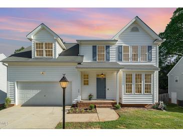 Charming two-story home with a well-manicured lawn and inviting front entrance at 2612 Alder Ridge Ln, Raleigh, NC 27603