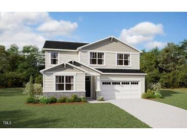 Charming two-story home featuring a two-car garage and traditional architectural details at 168 Sprenger St, Garner, NC 27529